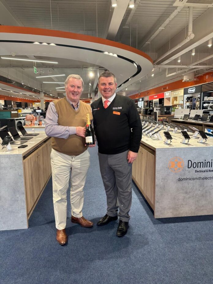 Pictured here is Sean Swan, Vice Chairman of Expert, congratulating Dominic Smith, Chairman, on this incredible achievement.